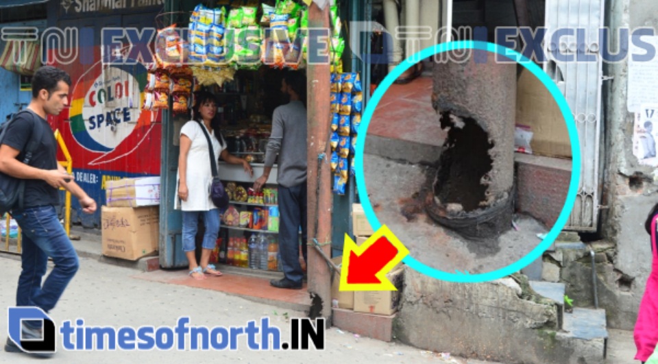 RUSTED ELECTRIC POLE STAND DANGEROUSLY AT KALIMPONG MARKET AREA
